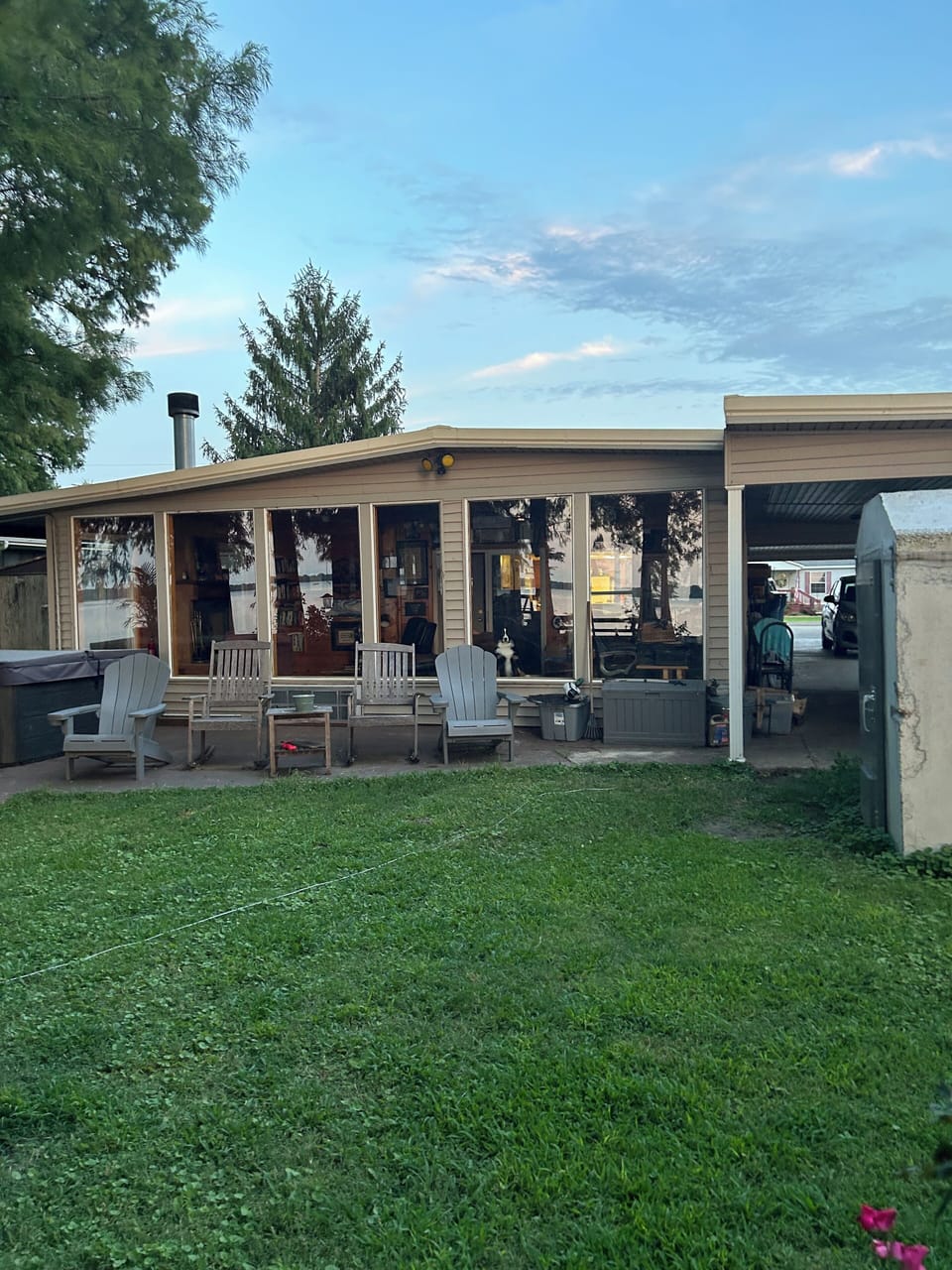 Lake side of the home with panoramic views and windows
