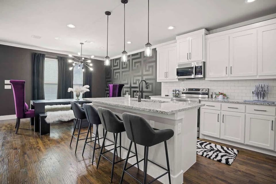 Ambrosia’s Hearth

Modern kitchen with stainless steel appliances, Keurig coffee maker, and a variety of snacks.