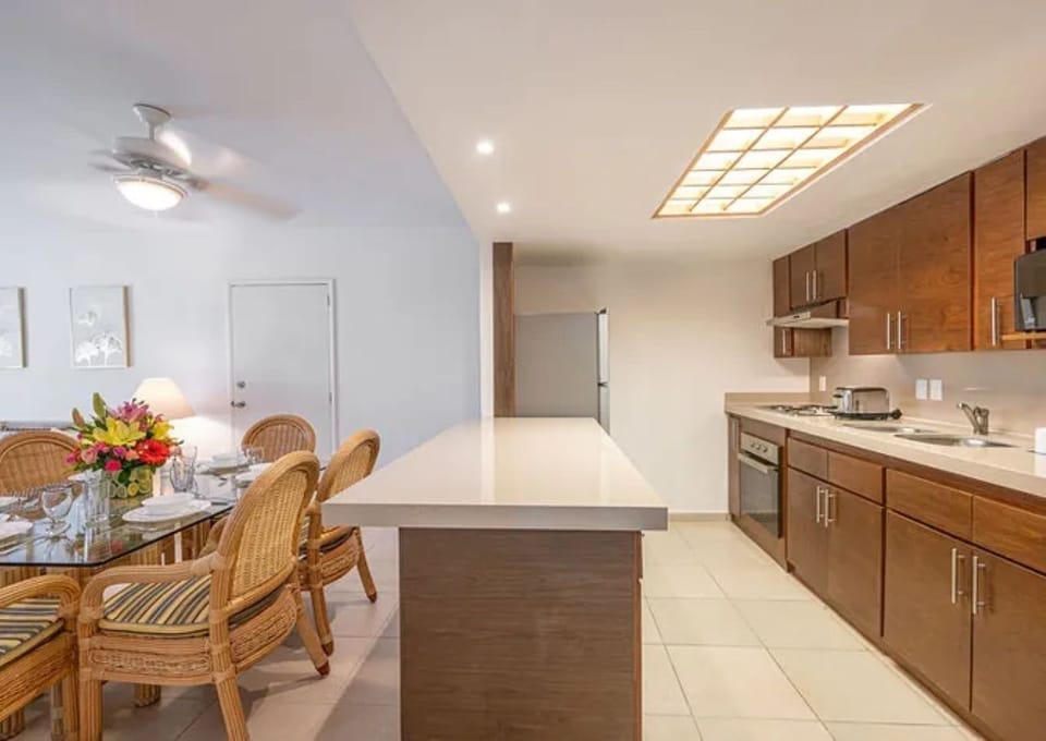 Cook with ease in the sleek kitchen with generous counters.