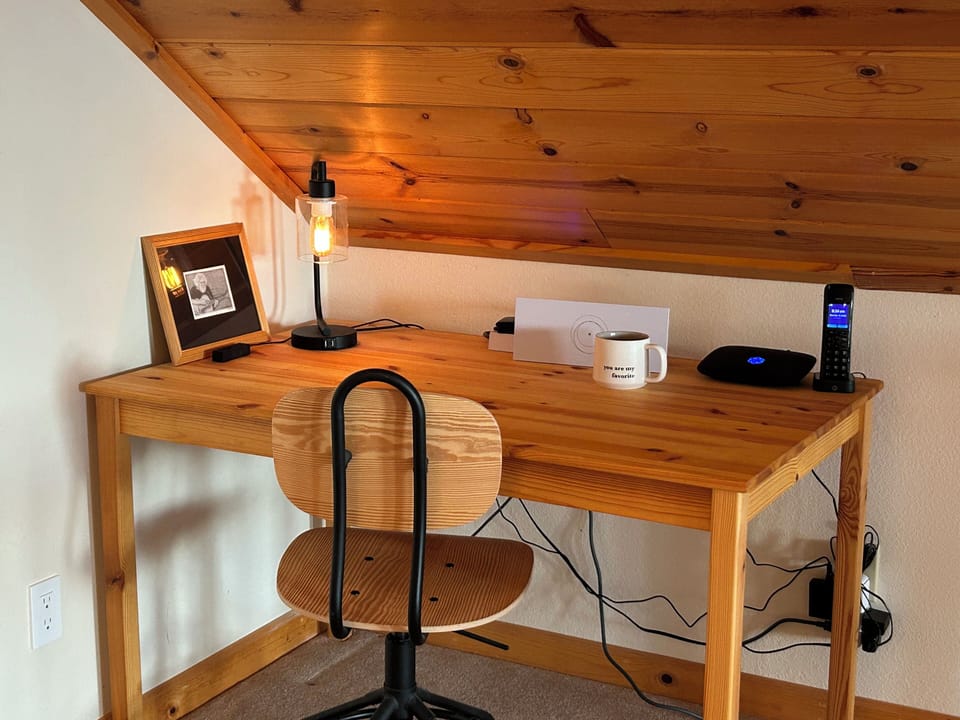 Need to take a zoom? This quiet desk in the loft is perfect for a little work.