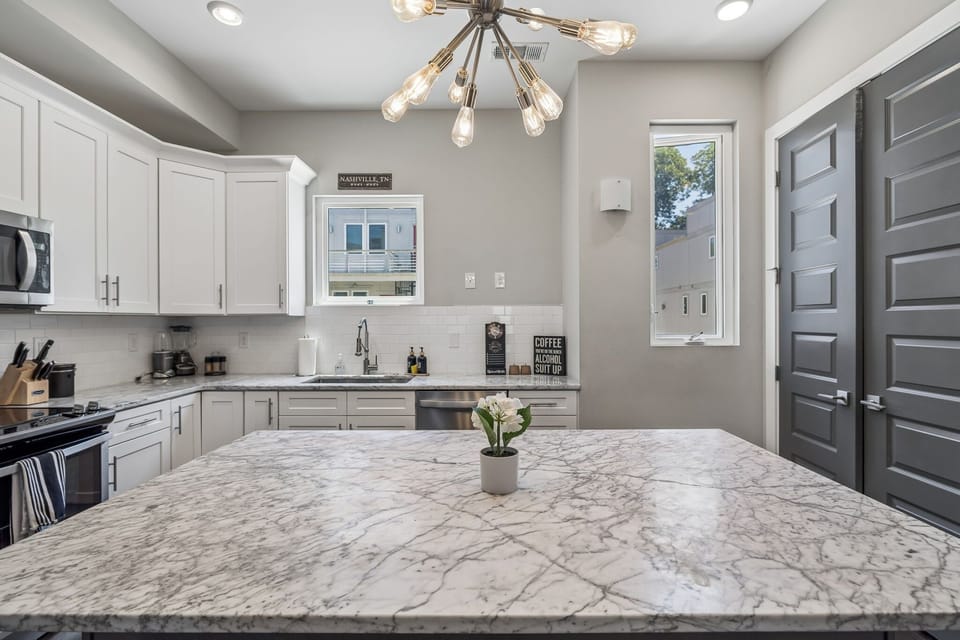 Kitchen: Prepare your favorite meals in the fully equipped kitchen, featuring modern appliances, ample counter space, and everything you need for a comfortable stay.