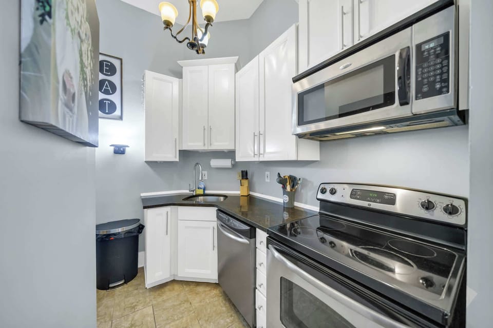 Fully-equipped kitchen with all the essentials for a cozy meal at home.