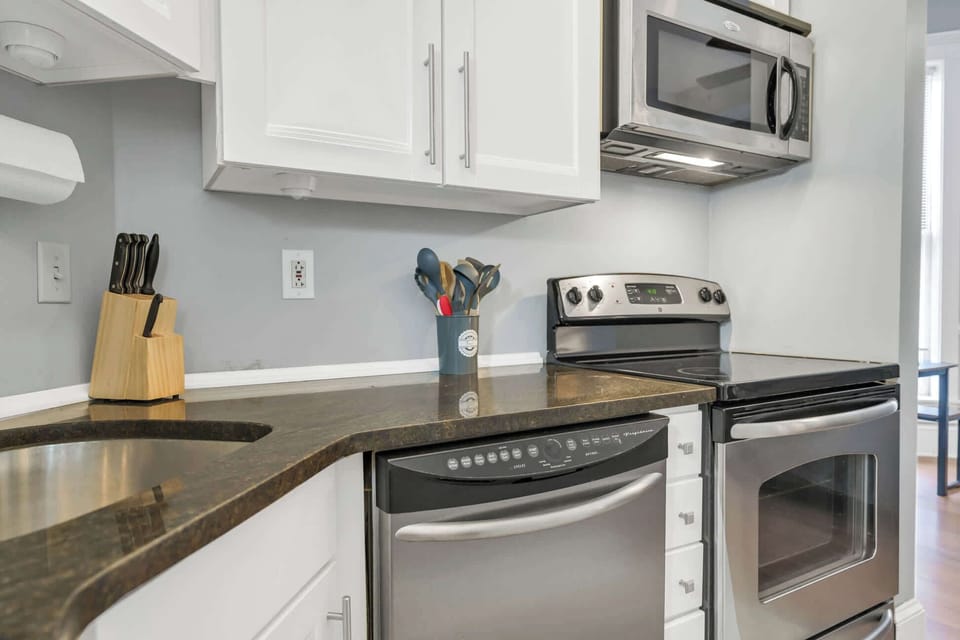 Fully-equipped kitchen with all the essentials for a cozy meal at home.
