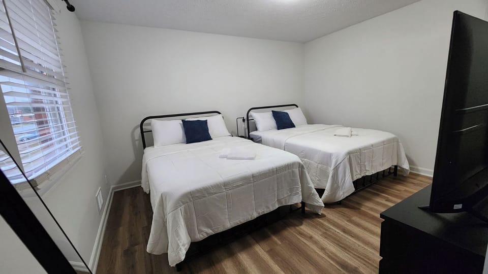 Bedroom 2: There's also a dresser and closet space to keep your things organized during your stay.