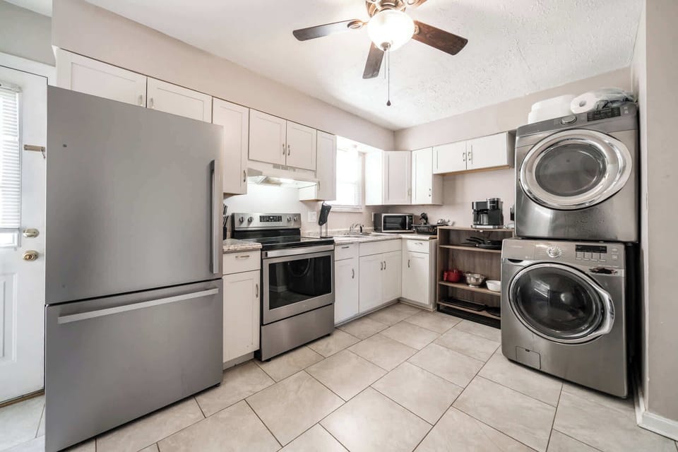 Kitchen: The kitchen has been recently remodeled to offer more space, with new stainless appliances, an island table, utensils, and a new washer/dryer, all designed to make it even more convenient and functional.