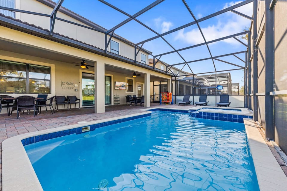Private pool with clear, open views of the championship fairway just beyond the patio.