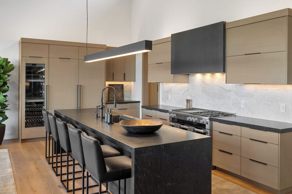 An expansive, chef's kitchen equipped like your home, not a vacation rental