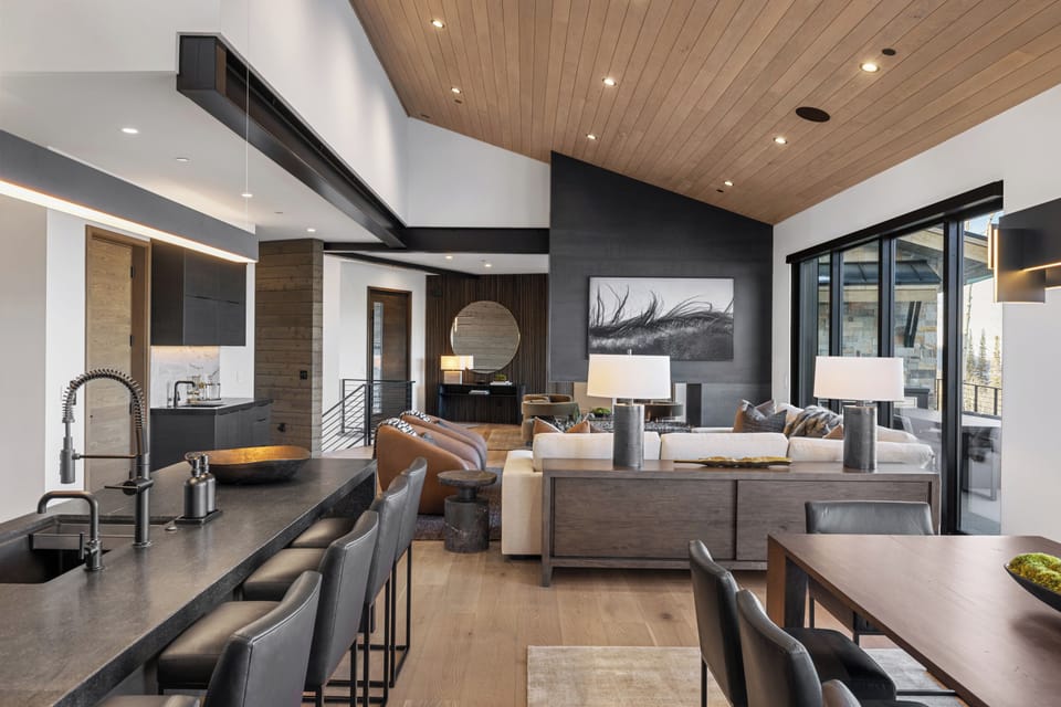 View from the dining area and next to the kitchen towards the living room