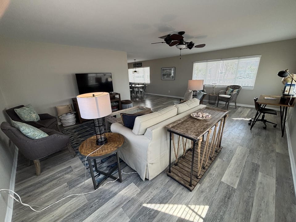 Spacious living room with cozy seating and natural light
