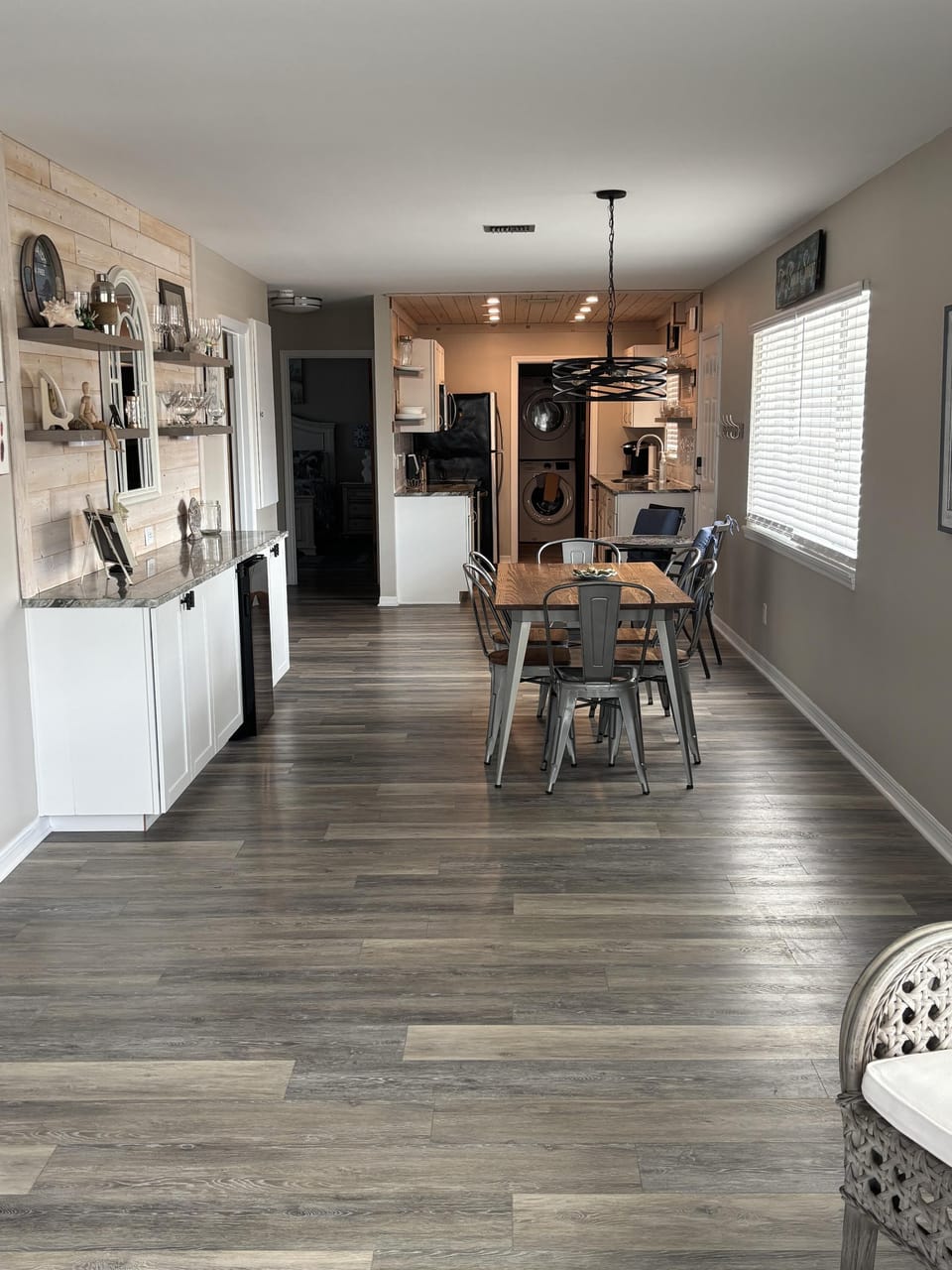 Spacious open-concept dining and living area with modern charm