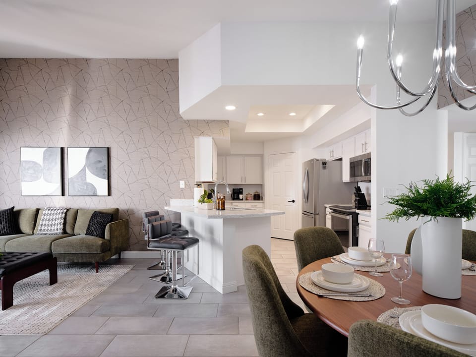 Family Room: Opens to Kitchen + Dining