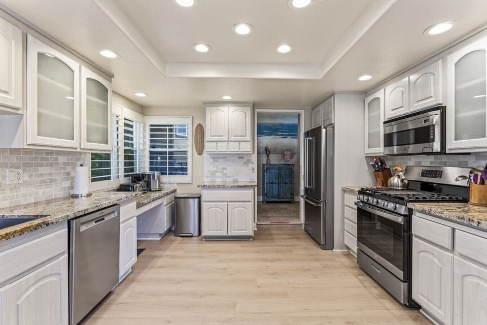 Fully equipped kitchen with stainless appliances and plenty of prep space