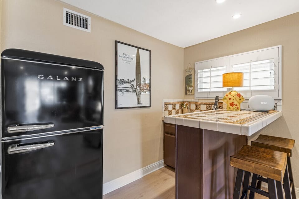 Retro-style mini fridge and coffee station