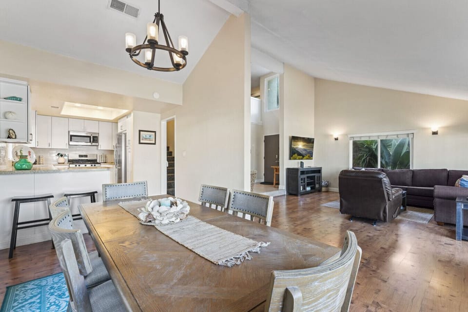 Open-concept living and dining area designed for comfort, connection, and easy entertaining.