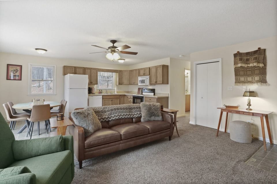 The living room, kitchen, and dining area.