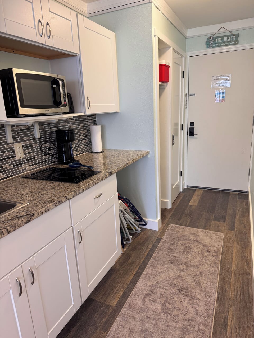 Modern, well-organized space with sleek finishes and ample storage