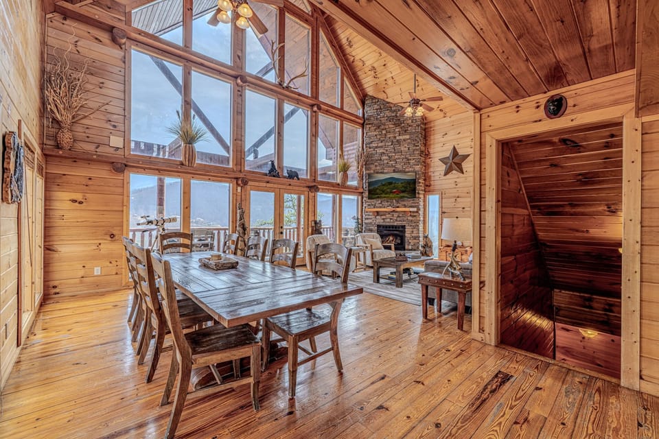 Dining and living area with stairs to lower level