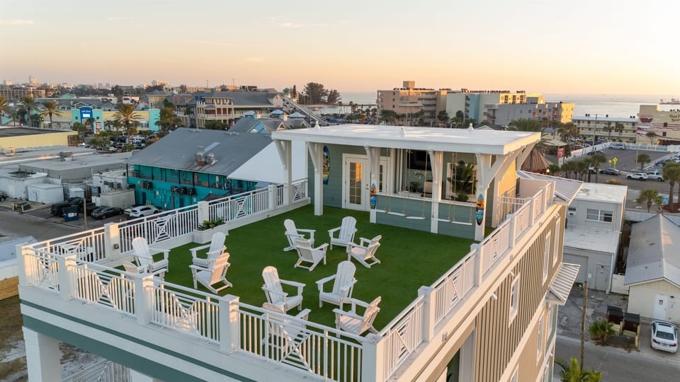 Stunning rooftop w/ panoramic water views and foldable chairs to make space for any type of event!