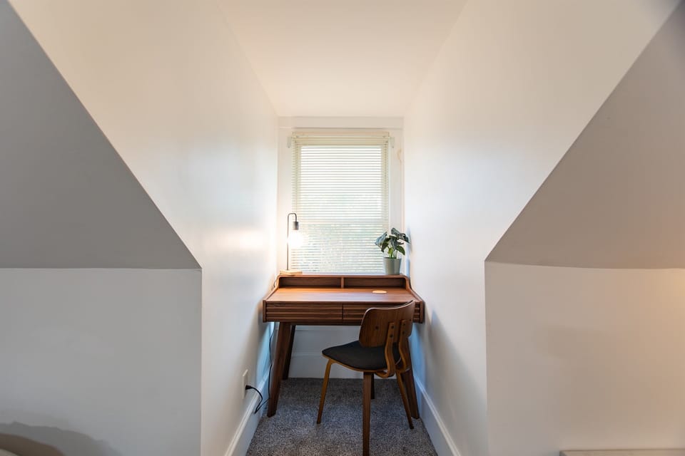 Office table at 4th floor queen bedroom