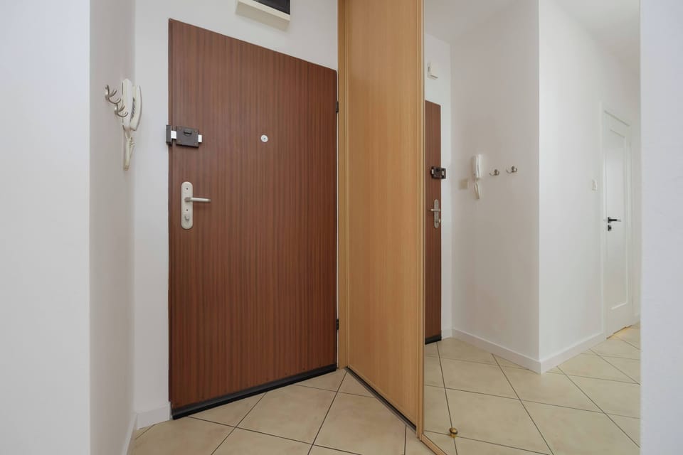 Neat and welcoming entrance hall with secure apartment access.