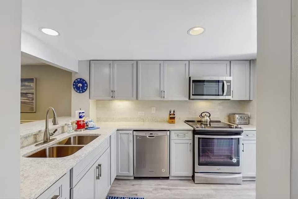 Modern kitchen with stainless steel appliances and ample counter space