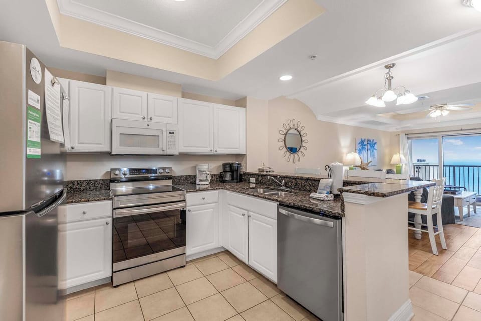 Full kitchen at Crystal Tower 906