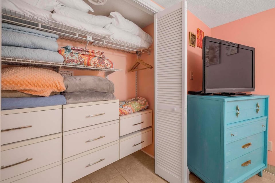 Guest bedroom closet with plenty of extra blankets