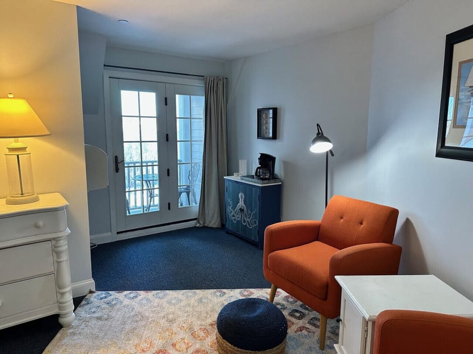 Enjoy a morning cup of coffee on the balcony overlooking the Sheepscot River
