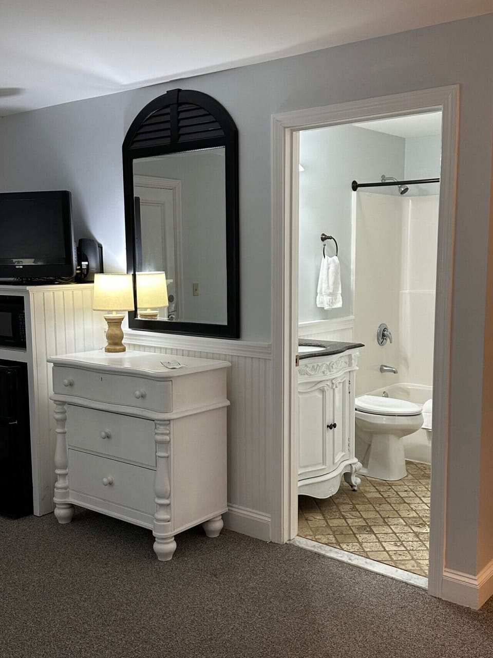 Full bathroom with shower and tub