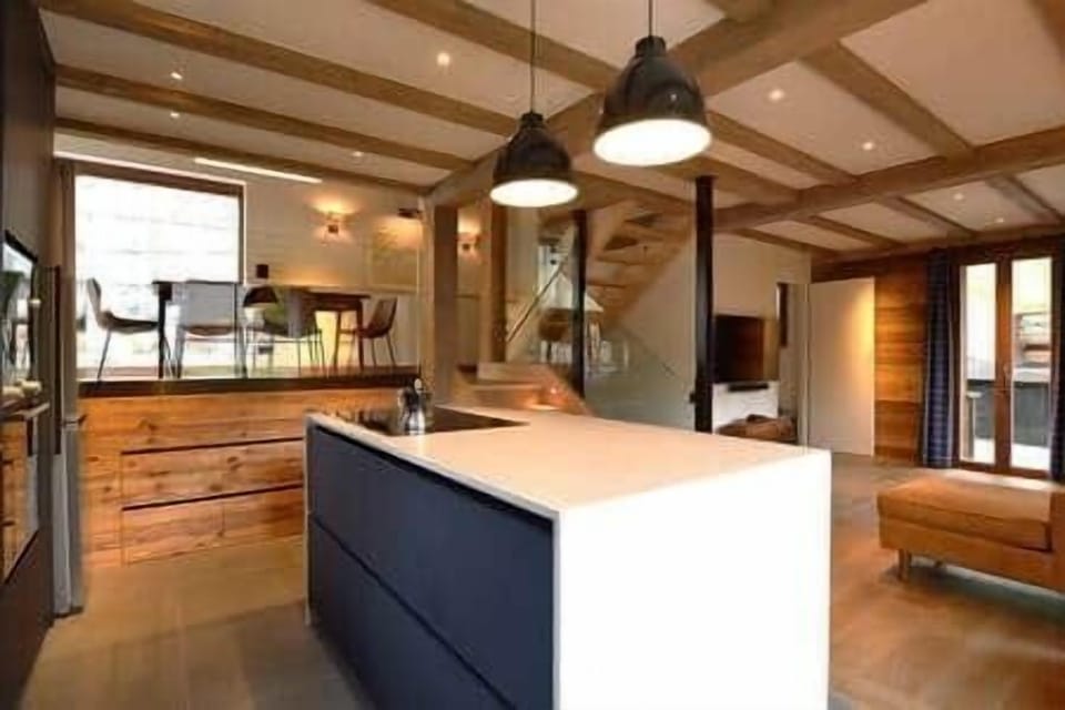 Kitchen and view up to dining area