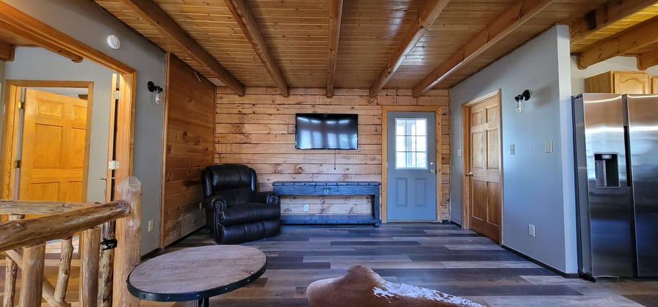 Rustic charm meets modern comfort with stylish furniture and inviting natural light!