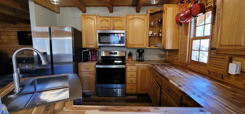 Modern appliances paired with rustic charm, perfect for culinary adventures!