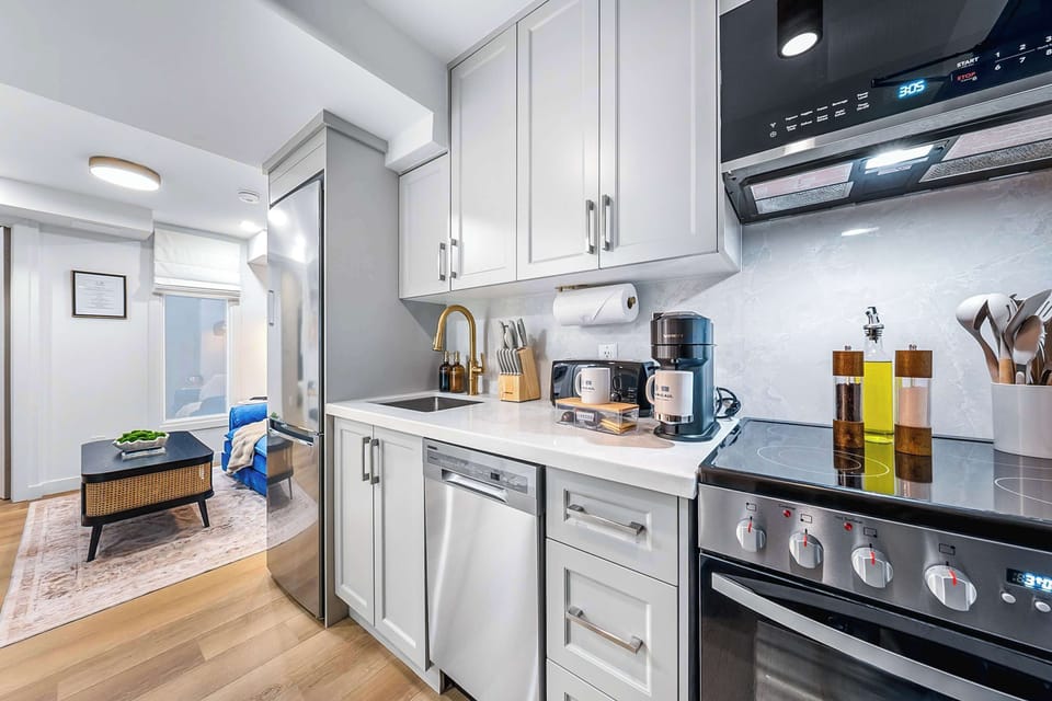 Fully equipped kitchen with modern appliances.