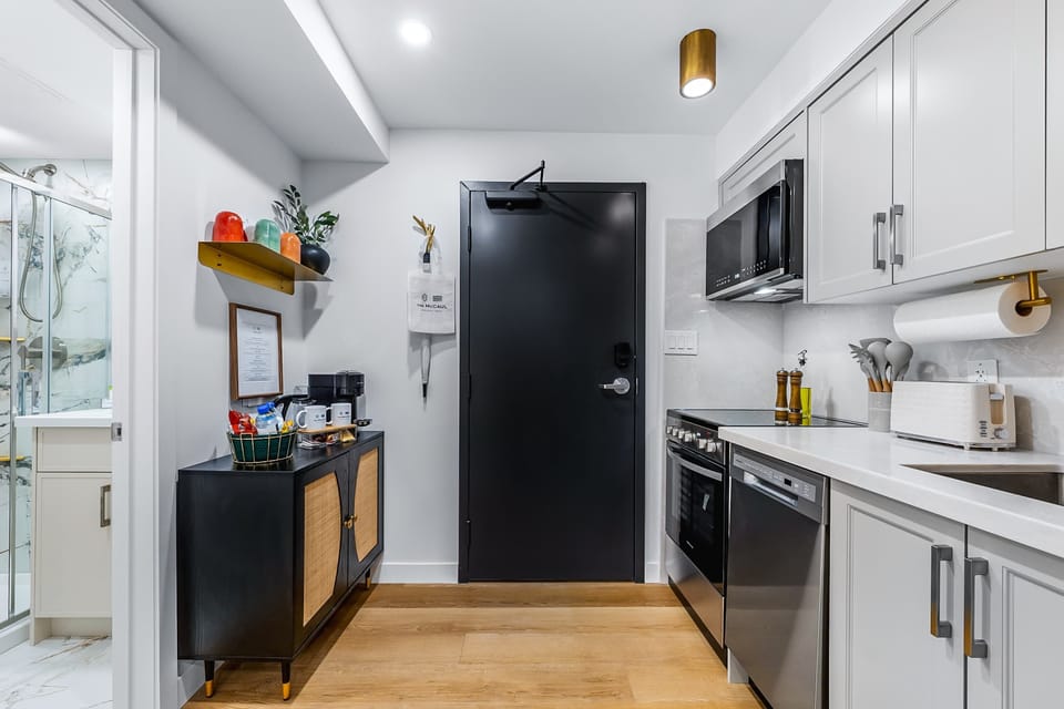Sleek kitchen space ideal for preparing meals during your stay.