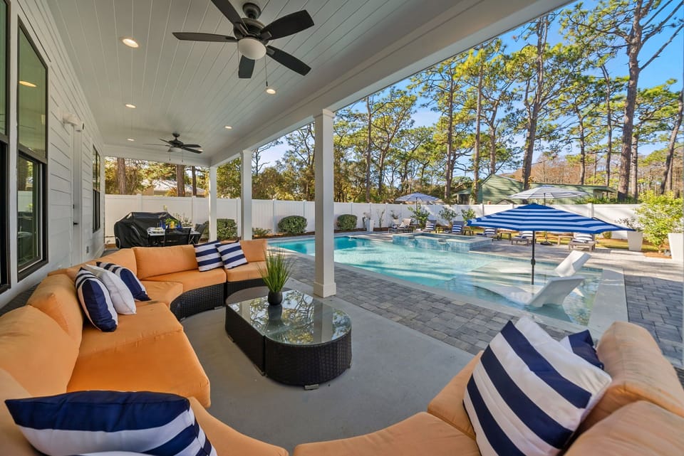 Spacious outdoor lounge overlooking the pool-the perfect spot to sit and relax!