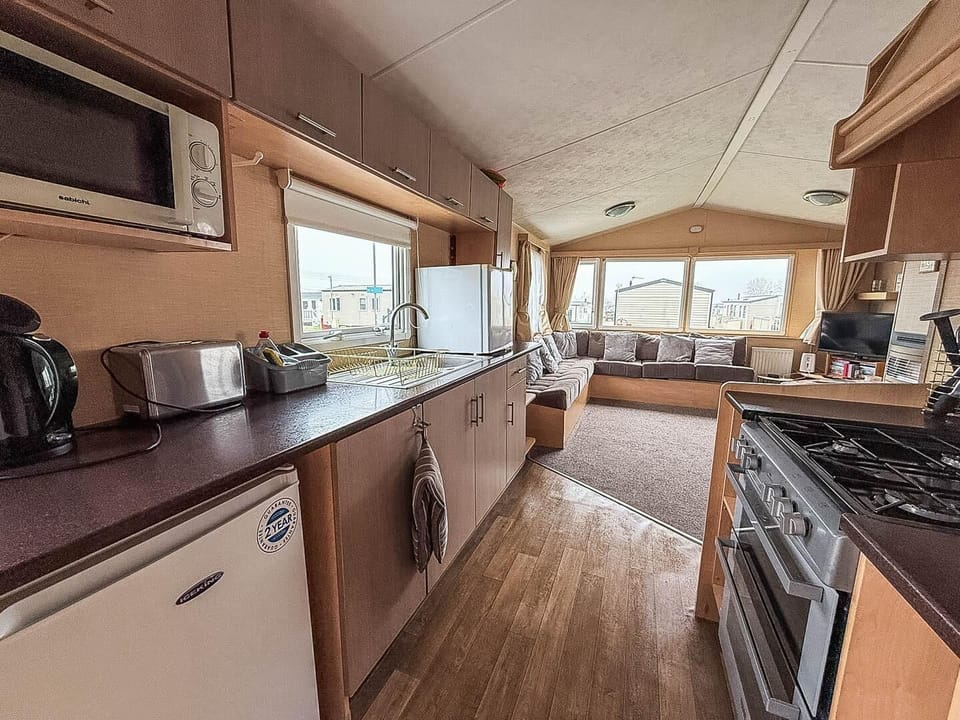 This compact kitchen is the perfect addition to the caravan, it has everything you need to prepare your family favourites.