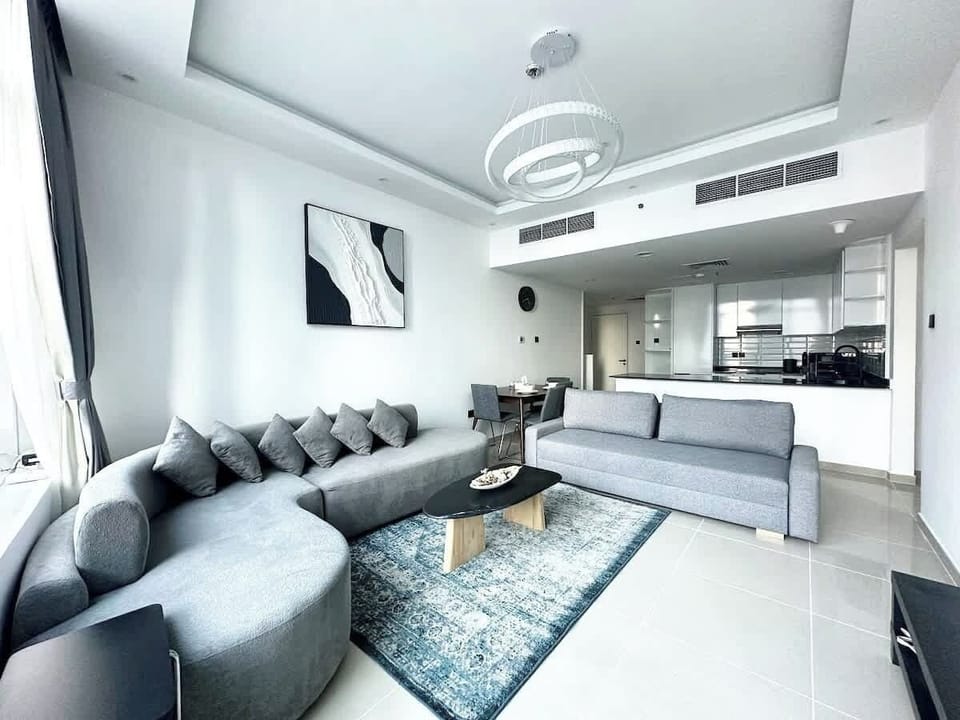 Full size living room, 4 seater dining table and fully equipped open kitchen