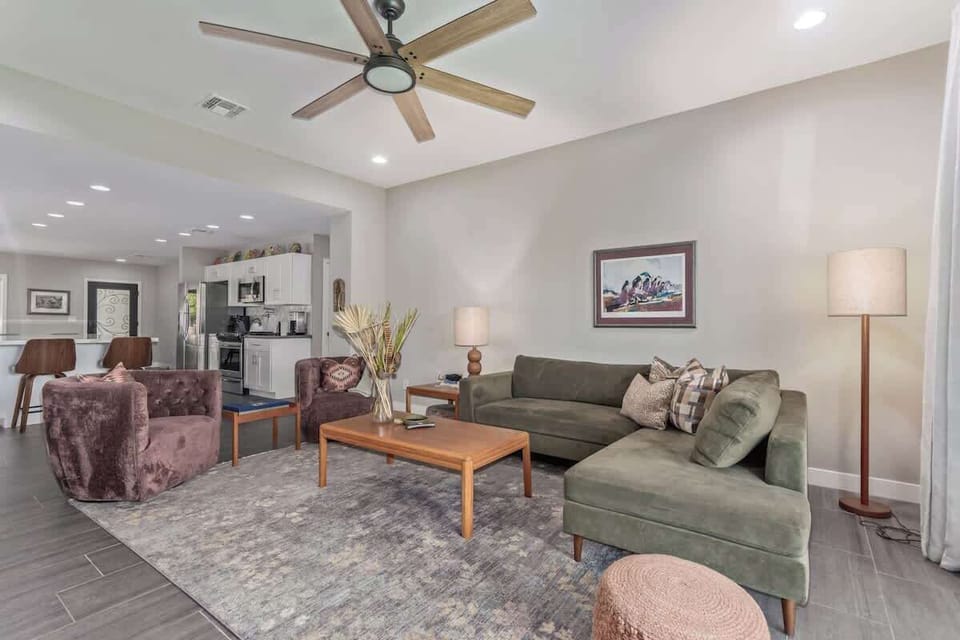 The ideal floorplan for "separate yet together" family gatherings, the living/kitchen and dining spaces are all connected linearly, but with distinct spaces within each for socializing/relaxing.