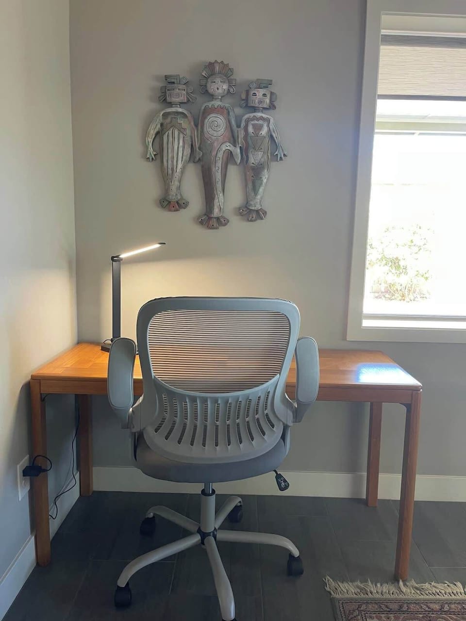 Dedicated work station  (not private) with work light, dual USB charging ports and ergonomic chair