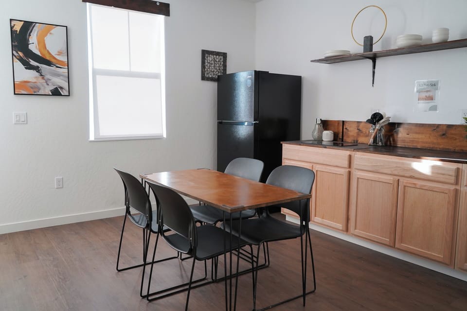 Spacious kitchen. Full refrigerator, full sink and 2 burner cooktop.