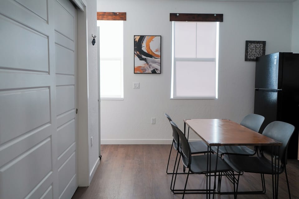 Spacious kitchen with clean seating area.