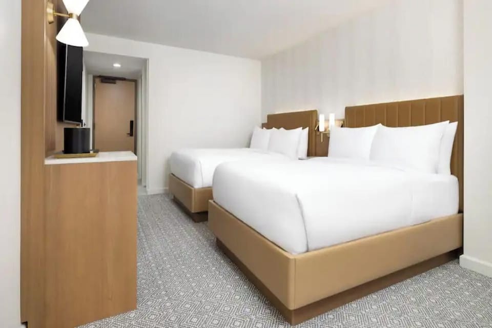 Unit with 2 Double size beds. Interior and views may vary based on location and availability.