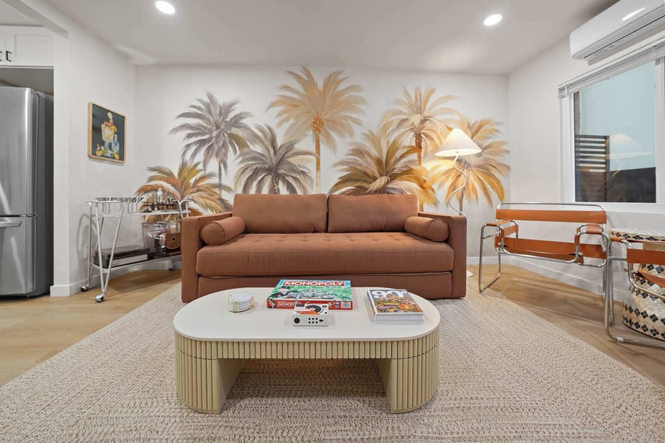 Warm, inviting space with sofa seating and natural tones.