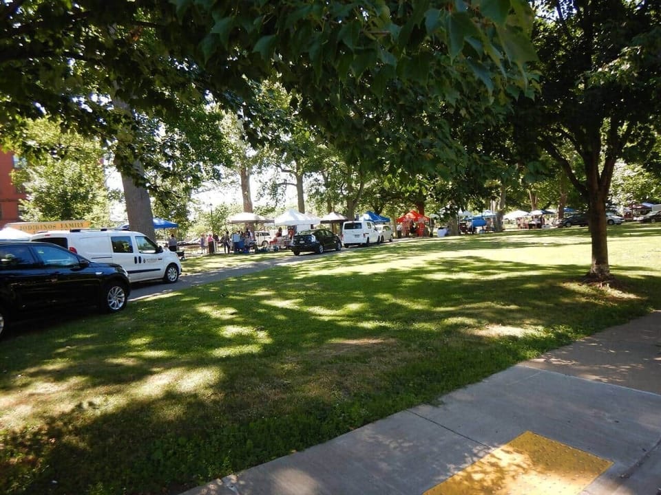 I/2 block from the house is the park.  This is Friday so the Farmer's Market is on:0