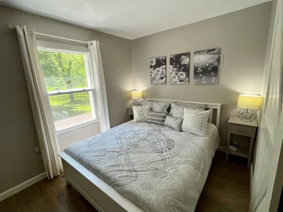 Comfortable main-floor queen bedroom  no stairs required to reach this bedroom