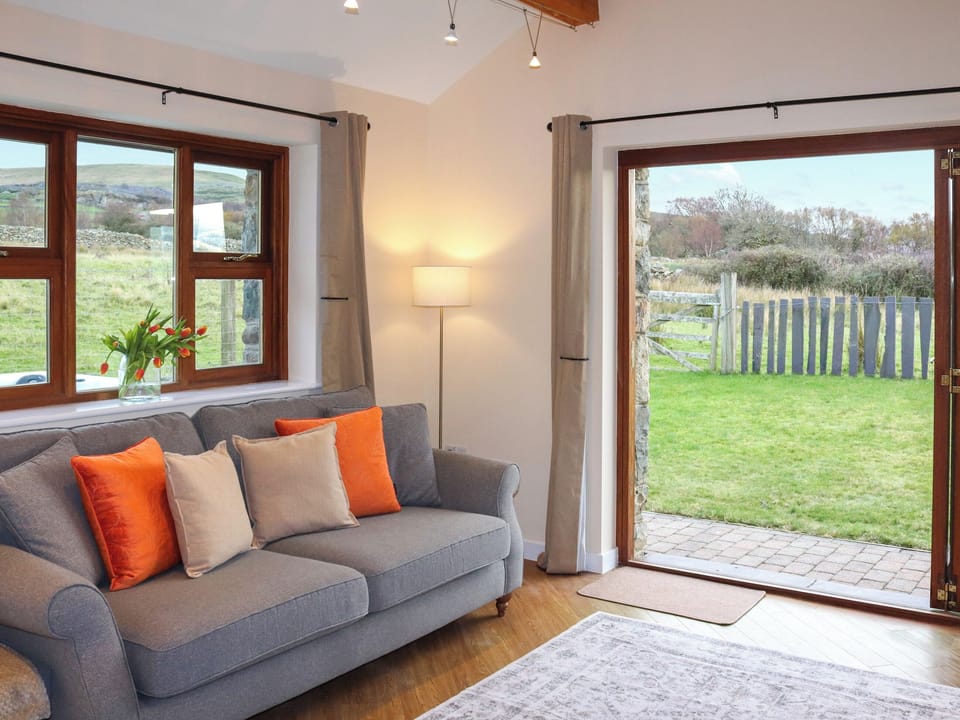 Living area | Beudy Newydd - Llwynpenddu Isaf Holidays, Llanllechid, near Bangor