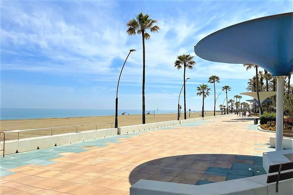 The promenade of Estepona and La Rada beach are just outside the building
