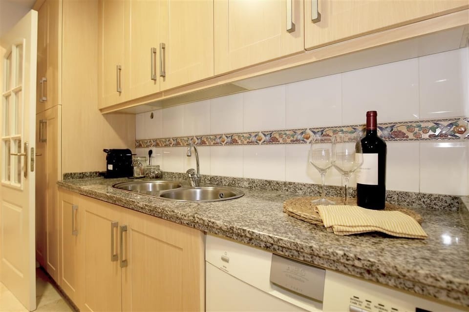 More pictures of the spacious kitchen in this apartment