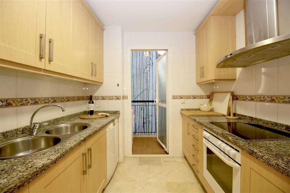 Spacious kitchen is fully equipped with all the appliances
