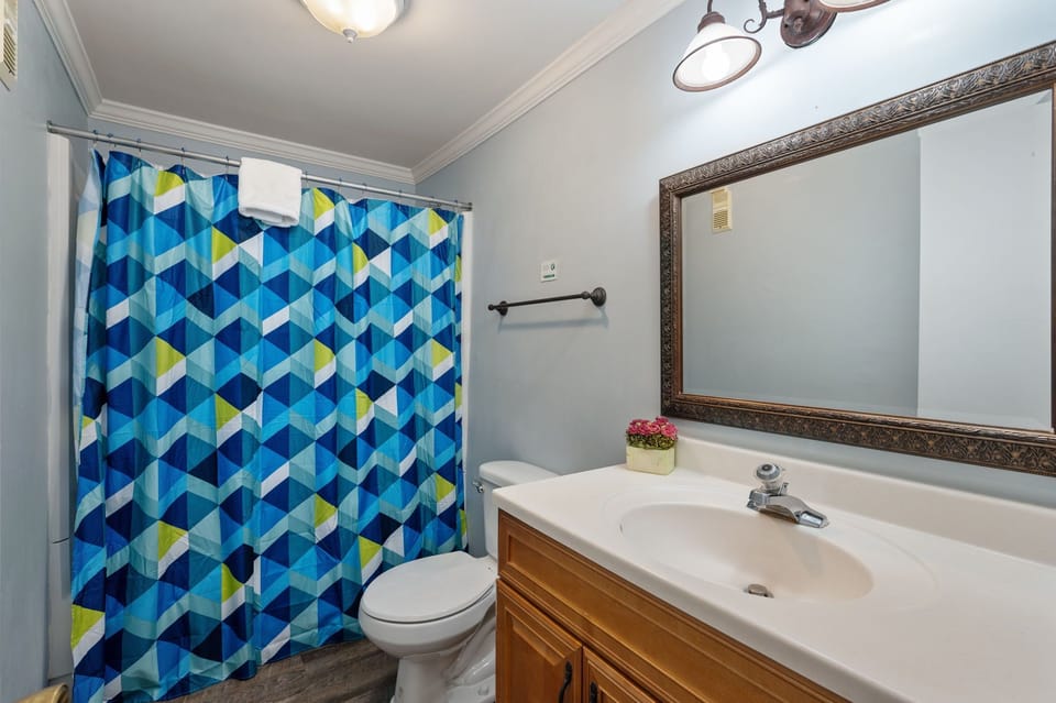 Get ready for the day in this bathroom equipped with modern amenities.